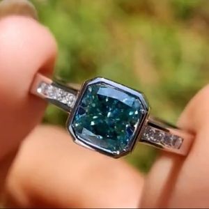 Blue green moissanite bezel set ring